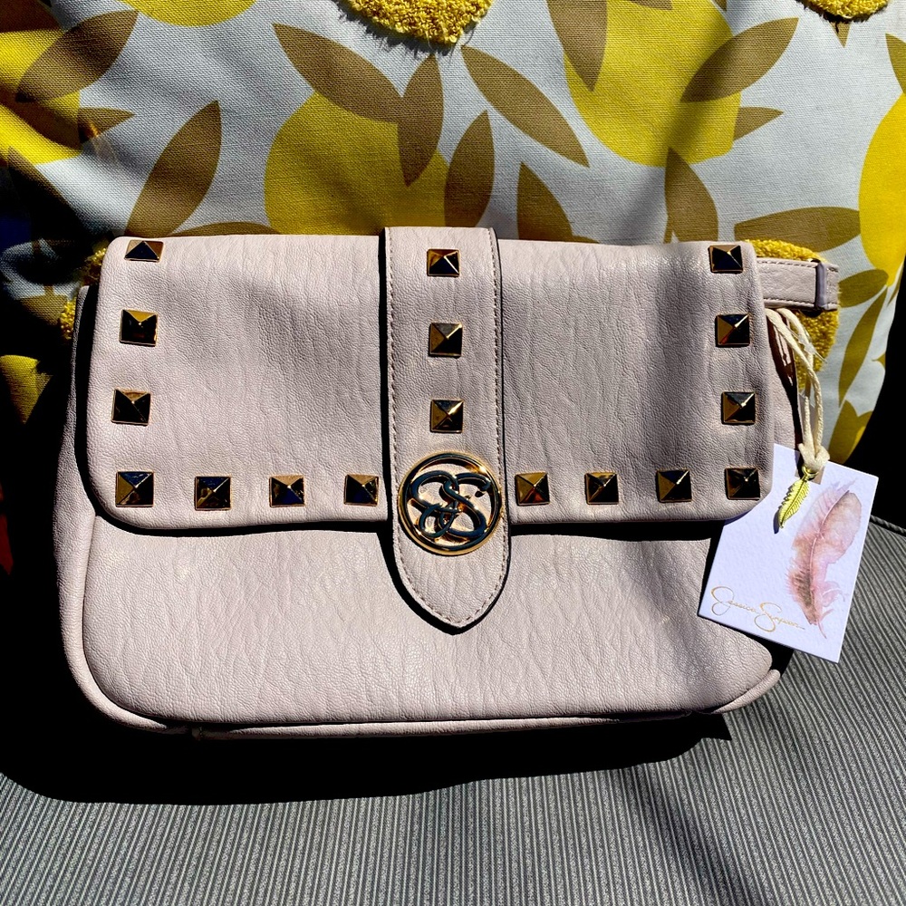 NWT. Jessica Simpson crossbody. Dawn color with gold stud features and accents.